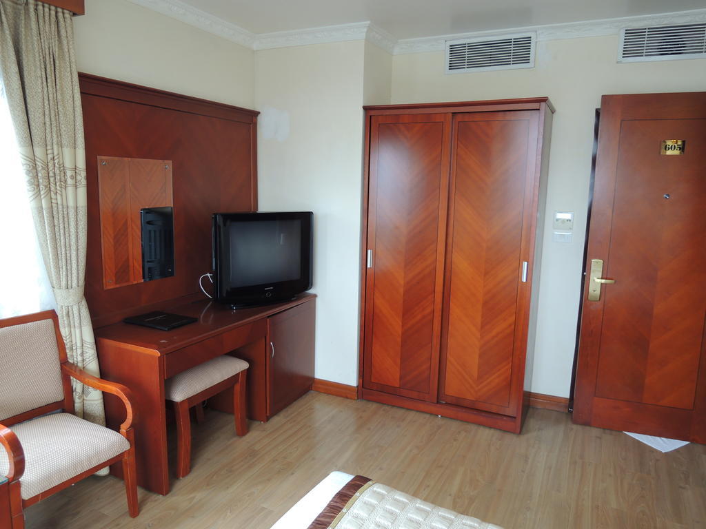 Satel Hotel Hanói Quarto foto